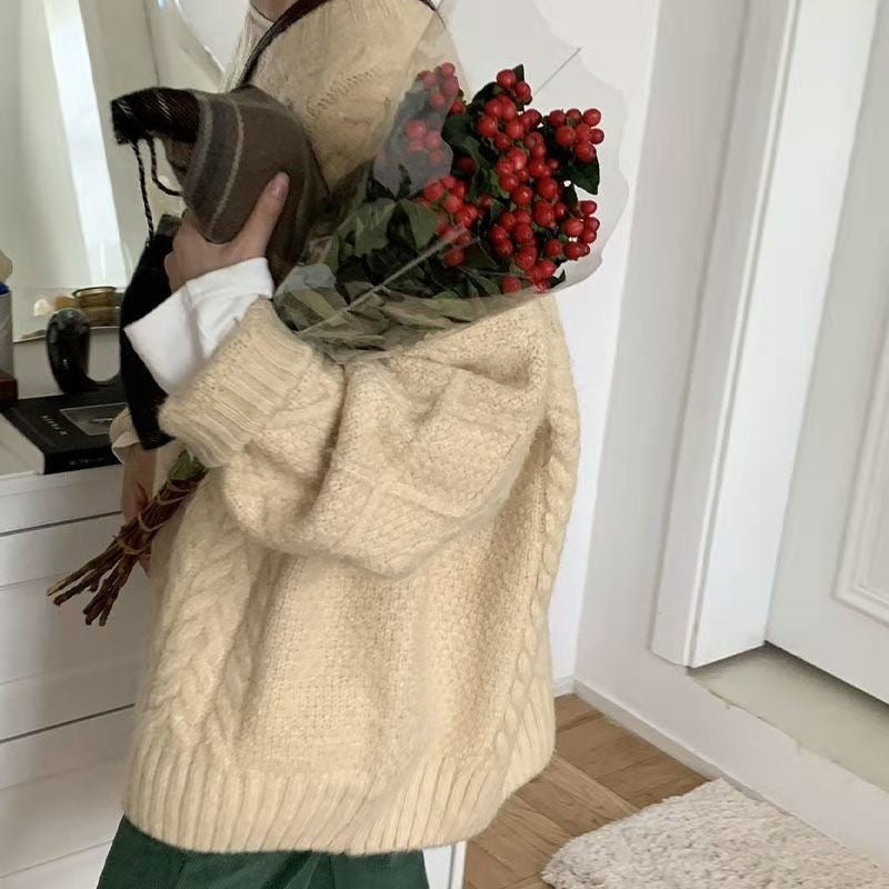 Women Wearing Loose Sweaters Outside The Street With Gentle Wind